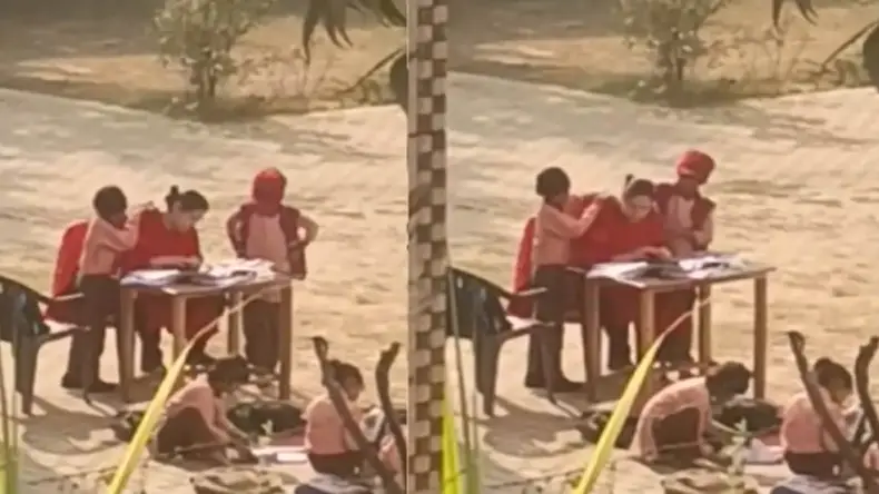 Viral: कुर्सी पर आराम फरमा रही टीचर का वीडियो वायरल, छात्रों से करा रही थी मसाज